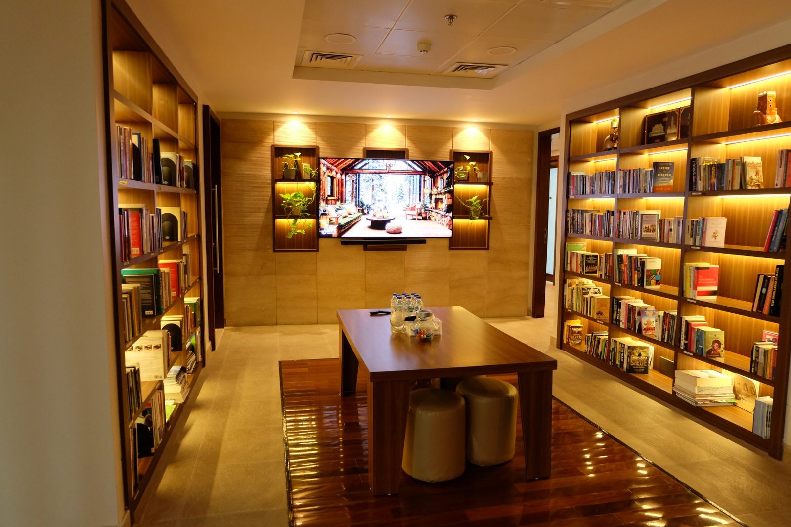 A corner office with desks along the window wall